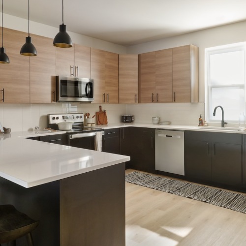Spacious kitchens with thoughtful details kitchen with wood cabinets and stainless steel appliances